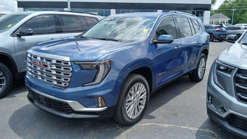 2024 GMC Acadia Denali front view scaled e1760180873812