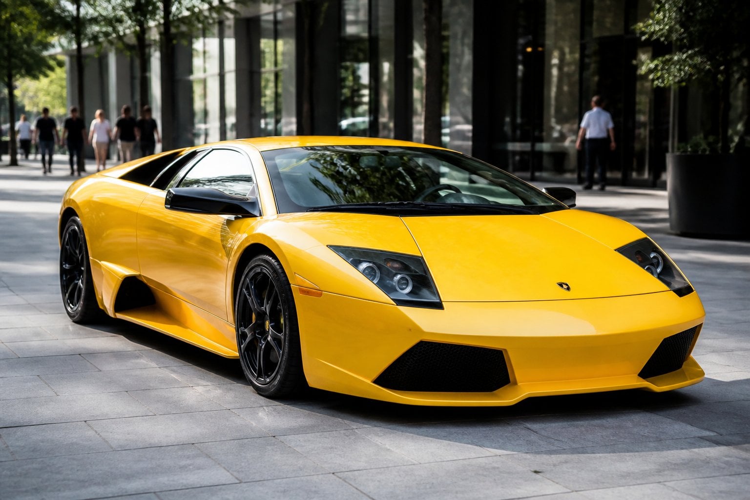 A Lamborghini Murciélago parked on a city street with buildings in the background.