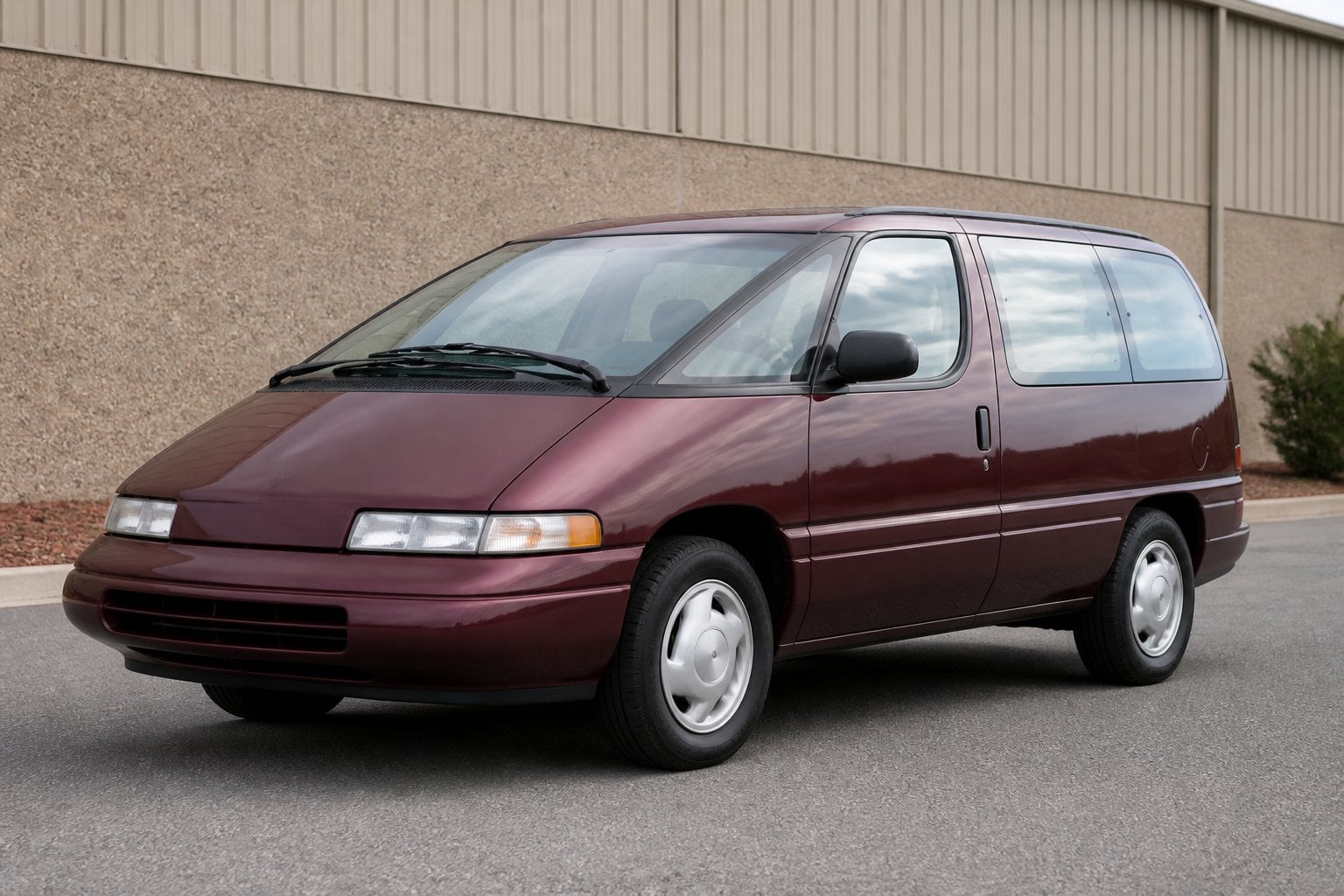 A vintage Chevrolet Lumina APV minivan parked on a paved lot.