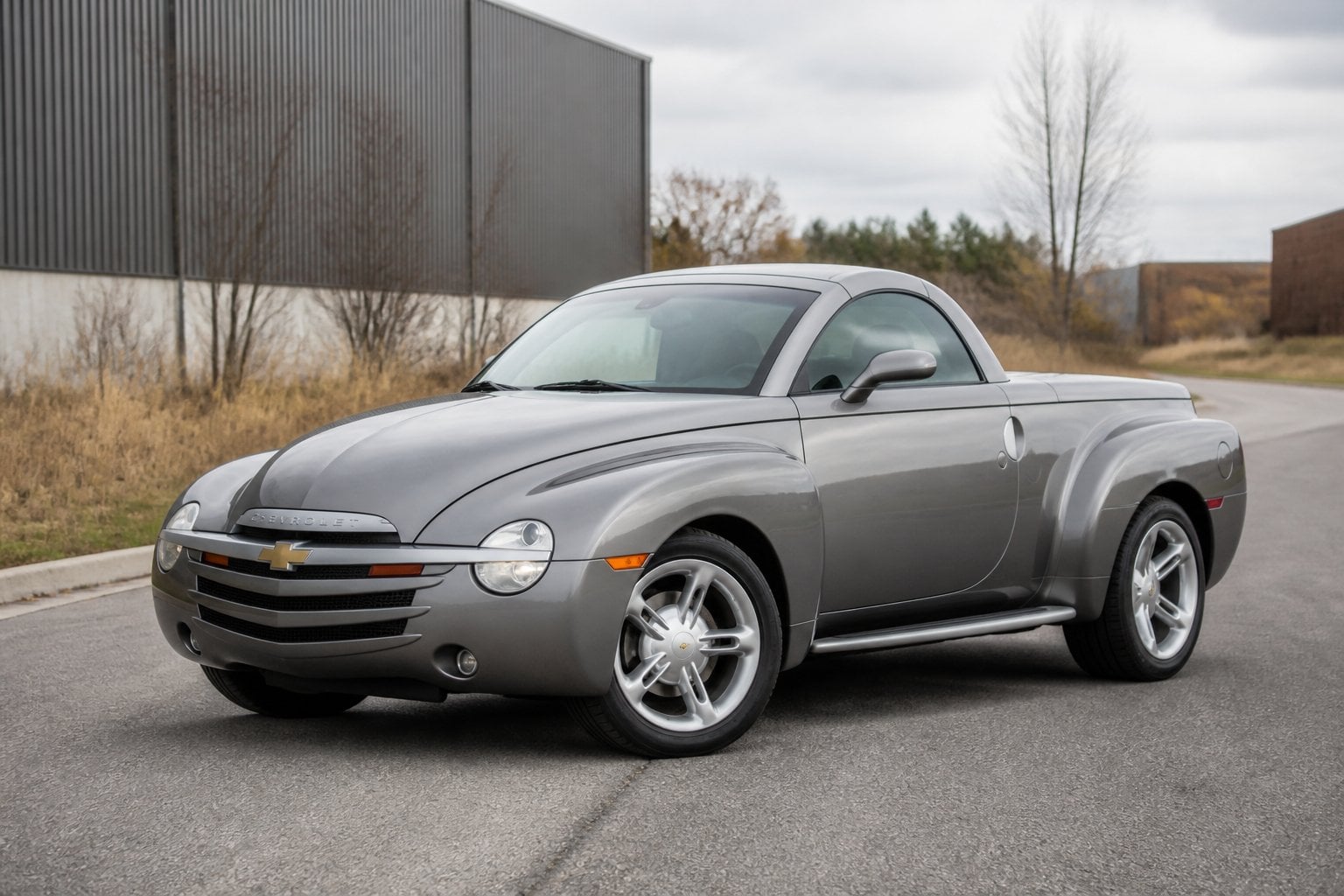 A Chevrolet SSR parked on a paved road in an outdoor setting.