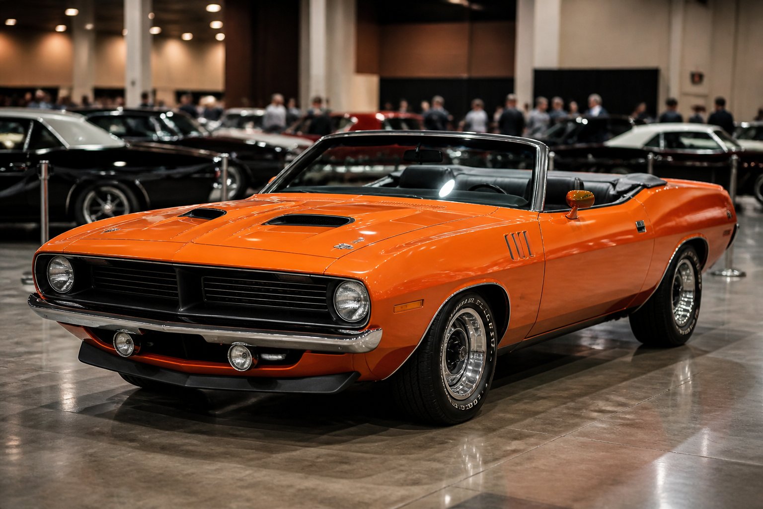 A restored orange 1970 Plymouth Hemi Cuda convertible displayed at a classic-car auction.