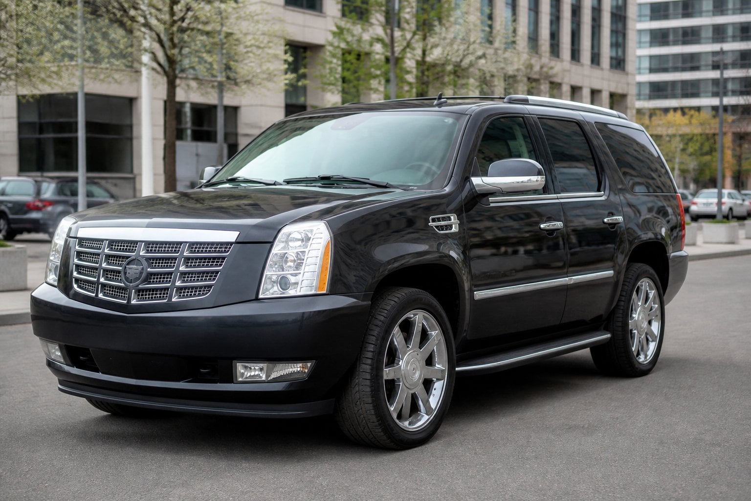 A third-generation Cadillac Escalade parked on an urban boulevard.