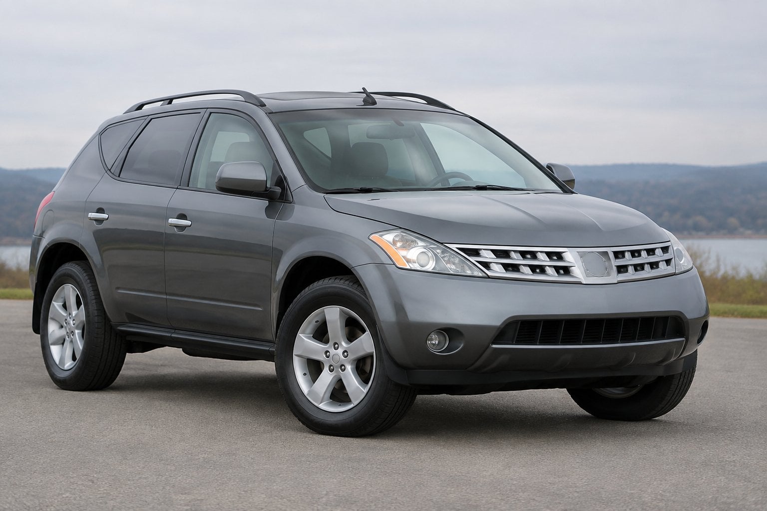 A silver 2005 Nissan Murano SUV parked on a paved surface.